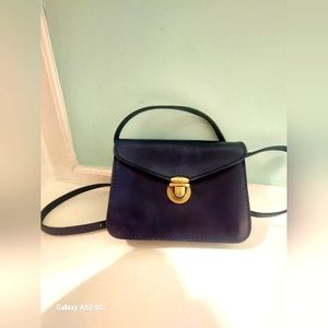 Made in Italy. navy blue cross bag